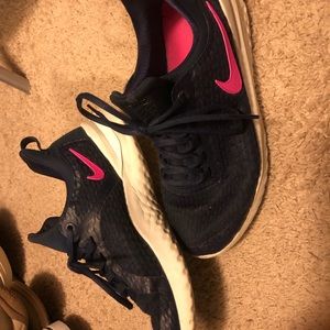 Nike pink and blue running shoes